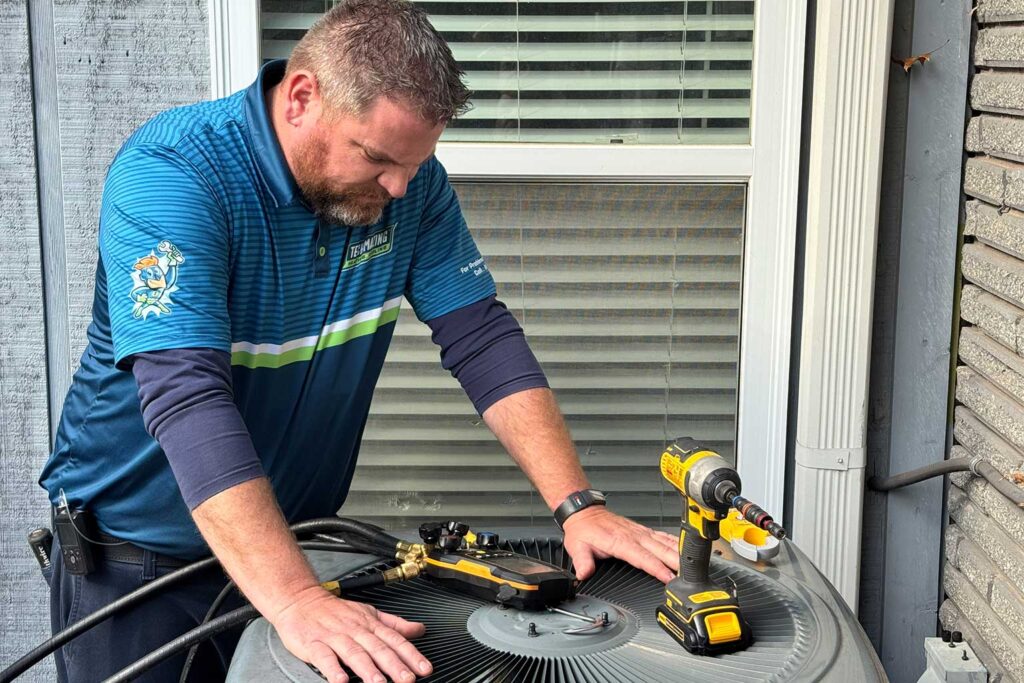 Techmazing tech working on HVAC unit
